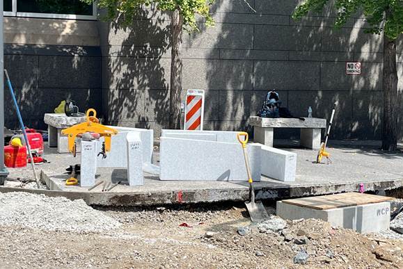 New granite curb ready for installation at Fifth Avenue and Ross Street