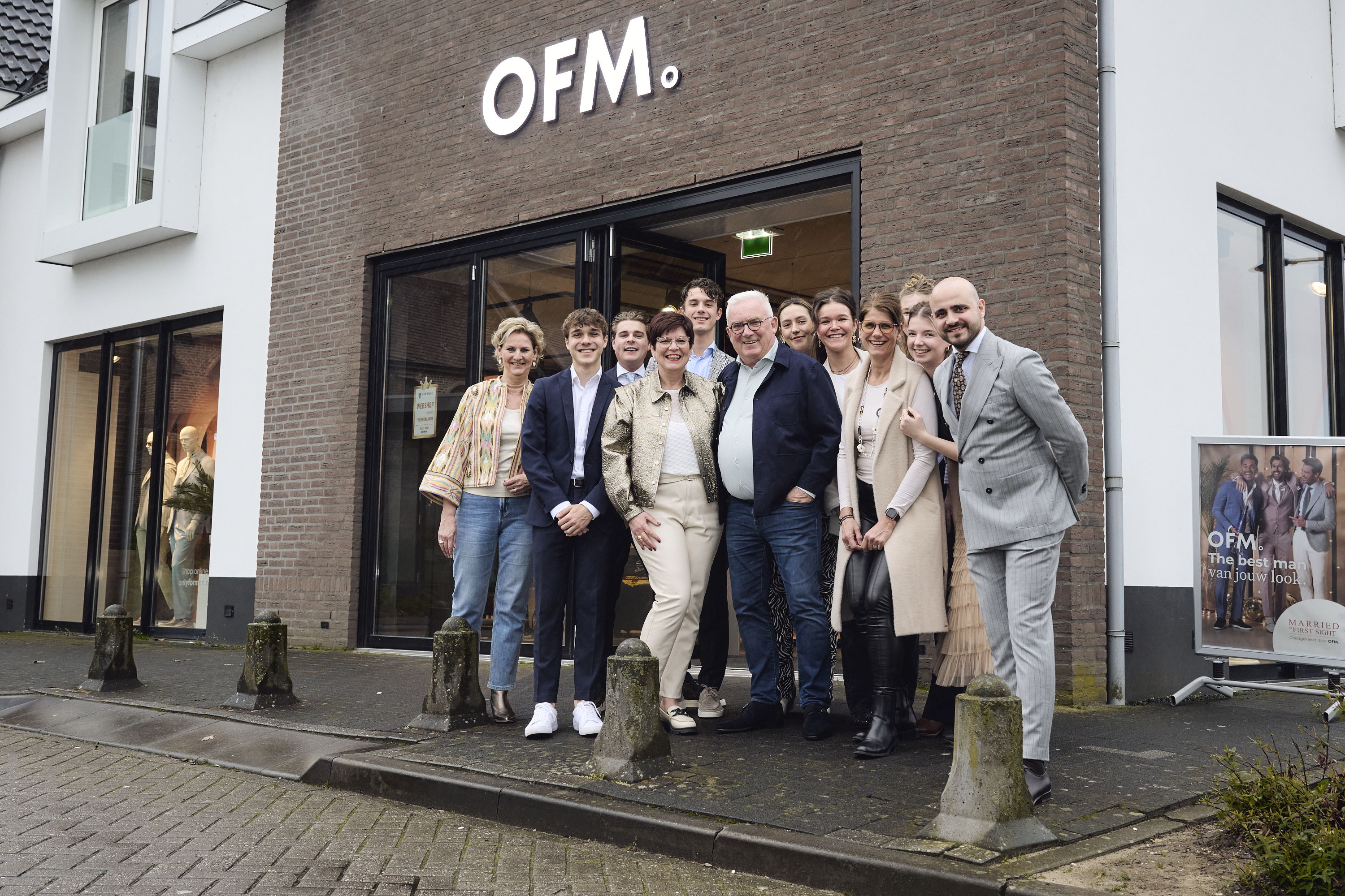 Modespecialiste Marja met Piet en team OFM.