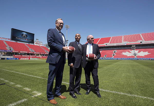 George Cope, Jeffrey L. Orridge and Larry Tanenbaum at BMO Field. (Photo: CP)