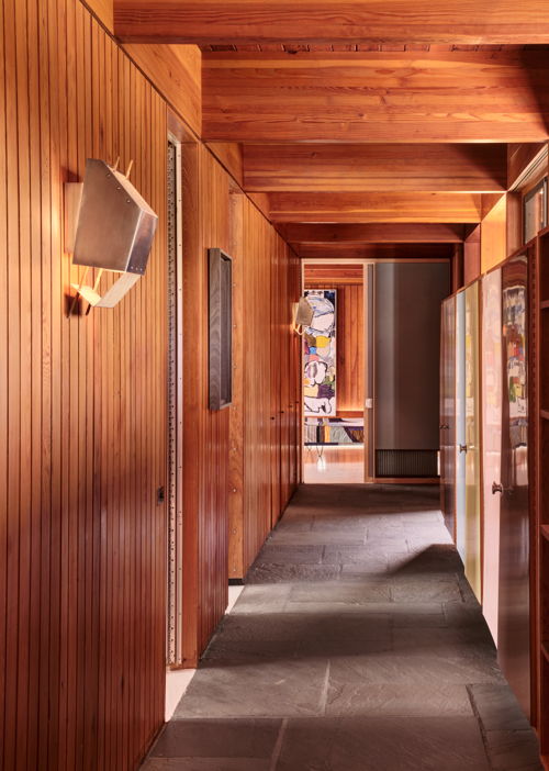At The Luss House: Blum & Poe, Mendes Wood DM and Object & Thing. The Gerald Luss House, Ossining, New York. Photo by Michael Biondo. Hallway with Green River Project LLC, Brushed Aluminum & Bamboo Sconces (2021).