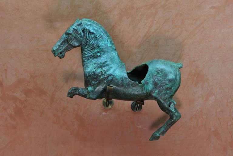 Galloping horse, bronze Roman sculpture, 1st century AD, in the Museo Nacional de Arte Romano, or National Museum of Roman Art. AKG9460140 © akg-images / Manuel Cohen