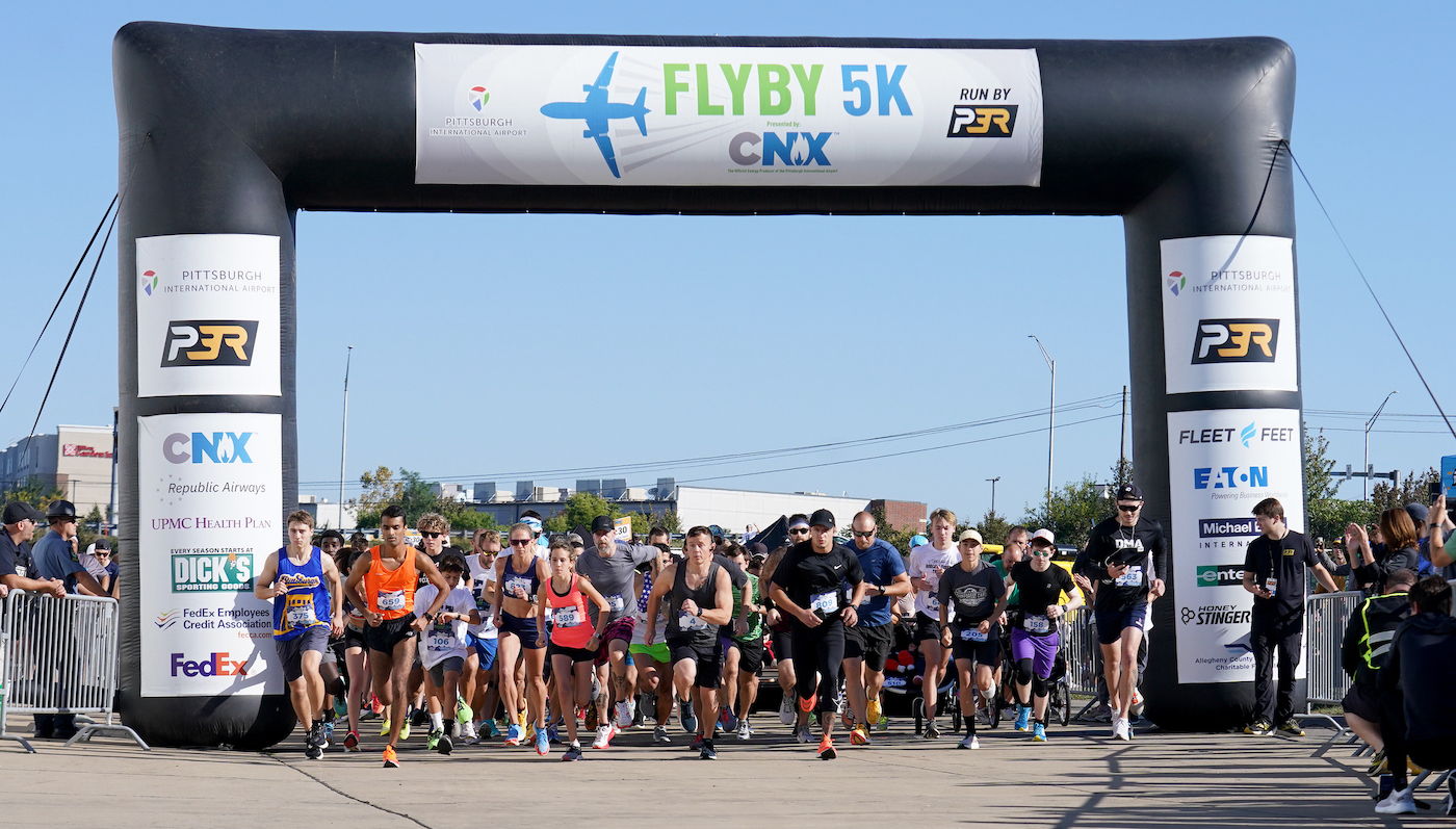 Runners take off at the 2023 Flyby 5K.