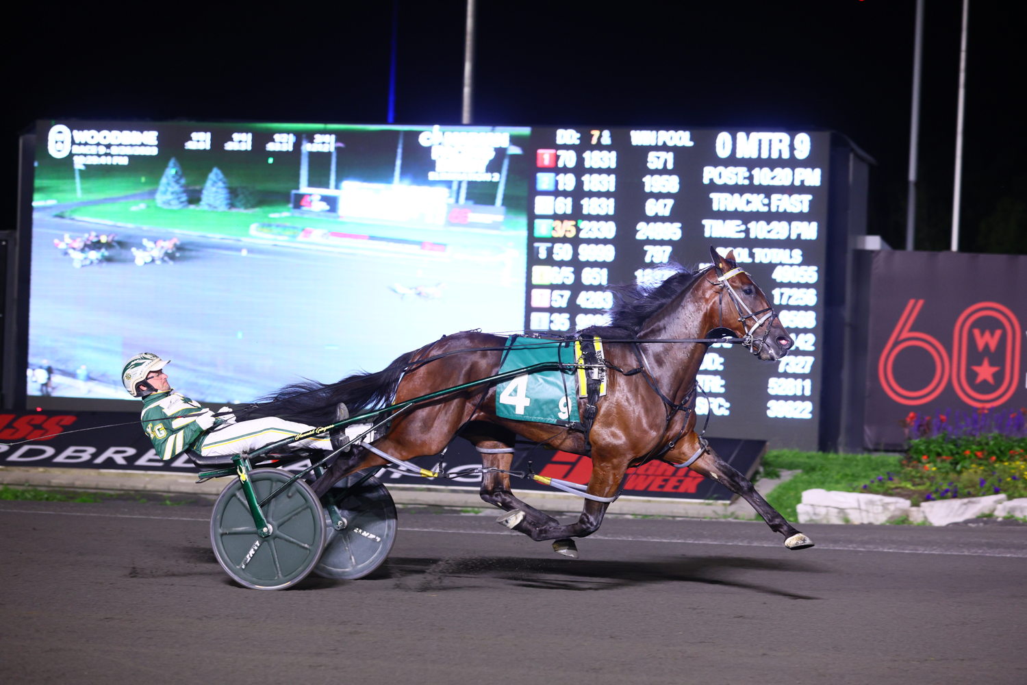 Bythemissal and driver Yannick Gingras winning the second Canadian Pacing Derby Elimination on August 26, 2023 at Woodbine Mohawk Park (New Image Media)