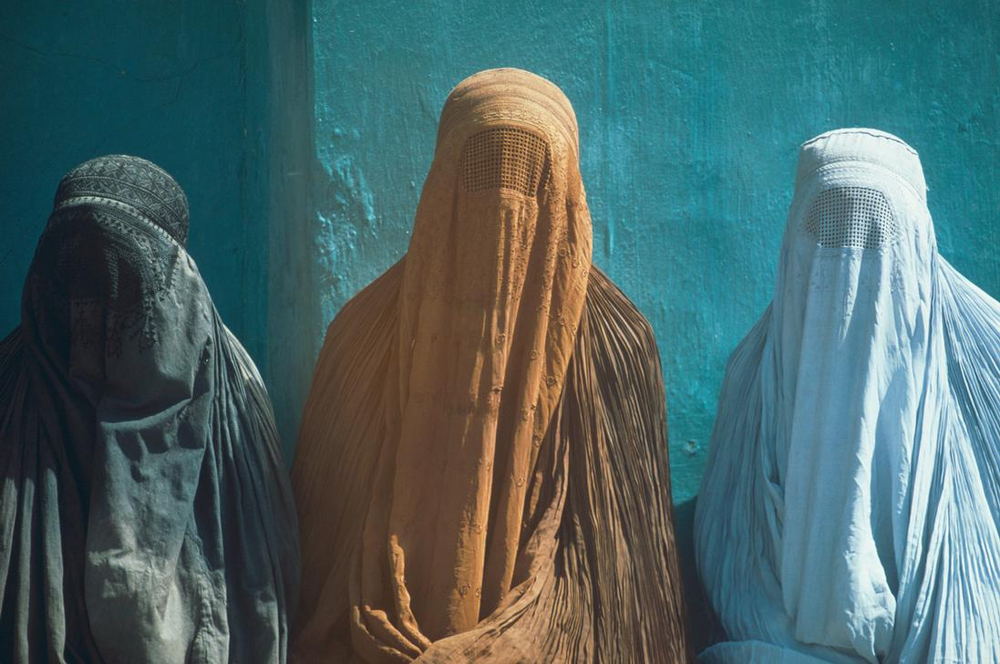 Three women wearing burkas, Afghanistan. Undated, pre 1980. AKG1938744