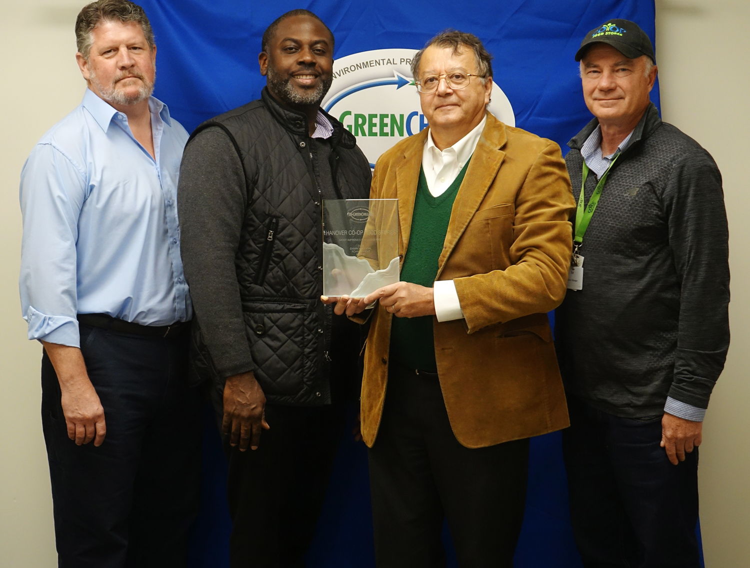 Shown (left to right) with this year’s award are Hanover Co-op managers and board members Jonathan Garthwaite, project administrator; Emanuel Ajavon, board secretary; Benoit Roisin, treasurer; Ed Fox, general manager.