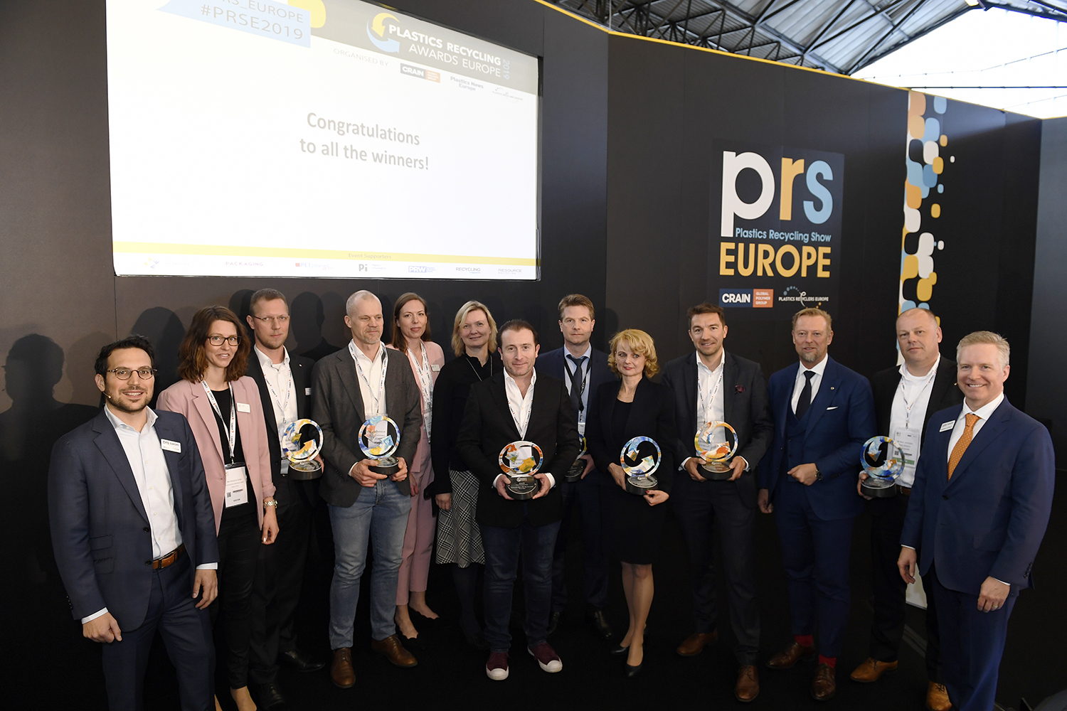 Winners of the Plastics Recycling Awards Europe 2019 (left to right):

Antonino Furfari, Managing Director, Plastics Recyclers Europe

Kristina Gross, Volvo Cars

Georg Gemende, Multiport GmbH

Andreas Andersson, Volvo Cars

Sandra Tostar, Volvo Cars

Gunilla Karlsson, Volvo Cars

Santiago Navarro, CEO & Co-Founder, Garçon Wines  

Philippe Hugelé , Ampacet

Manica Ulcnik-Krump, INTERSEROH Dienstleistungs GmbH BU recycled resource

Gian De Belder, Principal Scientist, Procter & Gamble

Michael Heitzinger, Managing Director, CSO bei EREMA Engineering Recycling Maschinen und Anlagen Ges.m.b.H.

Marc Verheijen, Cedo Folien- und Haushaltsprodukte GmbH

Brennan Lafferty, Vice President and Publisher of Crain Communications