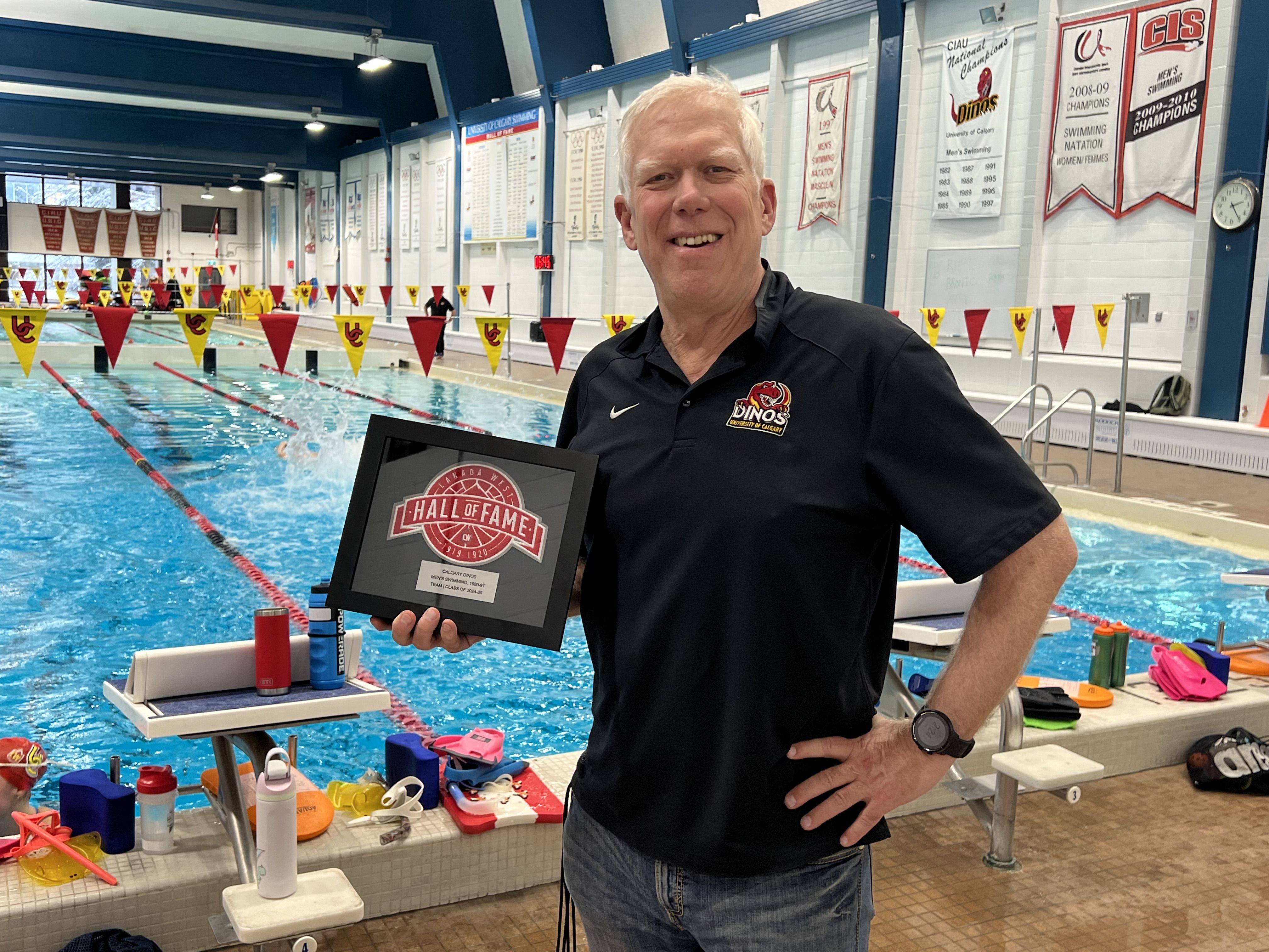 Dinos swimming head coach Mike Blondal