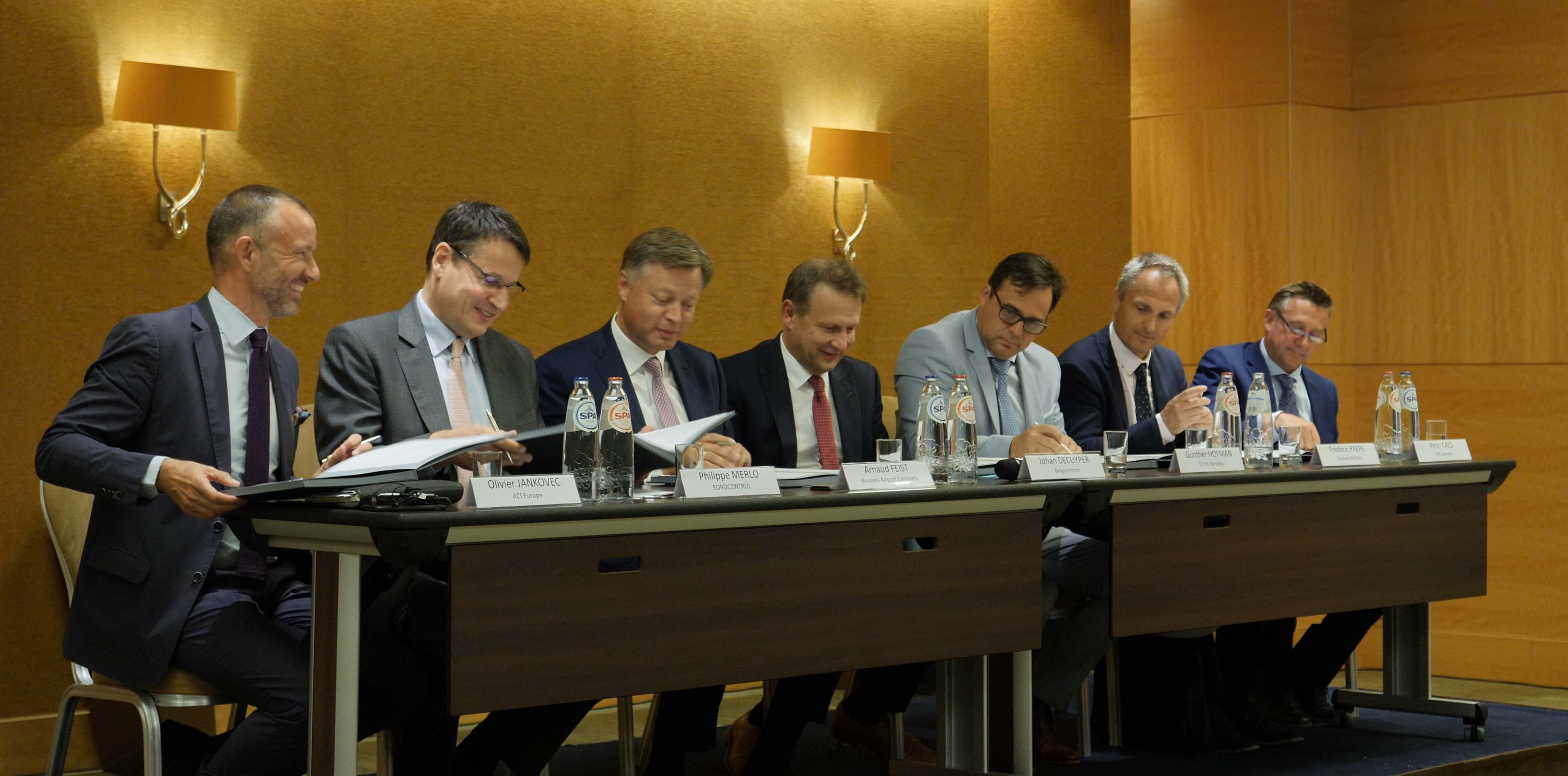 CEM signing ceremony: Olivier Jankovic (ACI Europe), Philippe Merlo (EUROCONTROL), Arnaud Feist (Brussels Airport Company), Johan Decuyper (Belgocontrol), Gunther Hofman (TUI fly Benelux), Frédéric Paepe (Brussels Airlines) and Peter Caes (DHL Aviation)