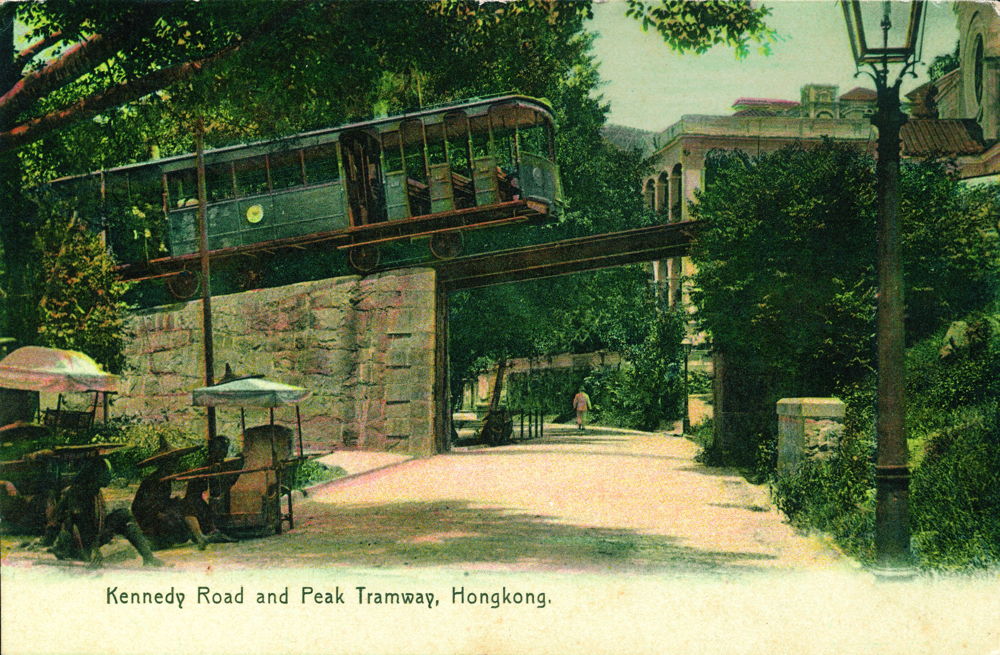 Vintage postcard showing The Peak Tram 
crossing Kennedy Road