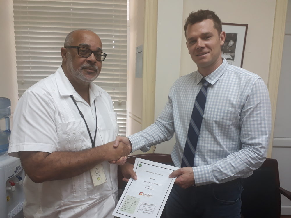Director General of the OECS Dr. Didacus Jules and Direct Relief Emergency Response Manager Daniel Hovey
