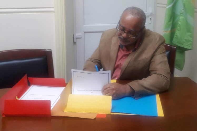 Director General of the OECS, Dr. Didacus Jules, signs Protocole d'Accord (MOU) in Saint Lucia.