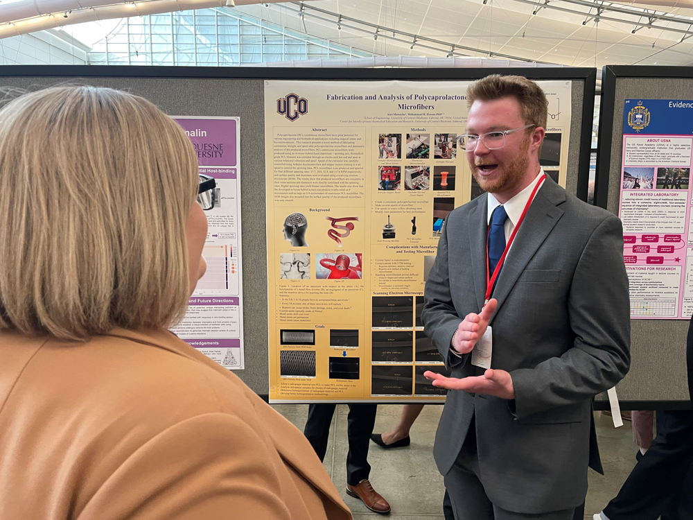 UCO student Alex Matsayko presents his research at NCUR 2025.