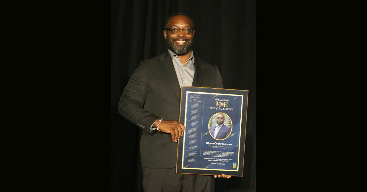 Rhyan Cochrane receives a New Pittsburgh Courier "Men of Excellence" award at an Aug. 21, 2026, celebration in Station Square. (J.L. Martello/New Pittsburgh Courier) Rhyan Cochrane receives a New Pittsburgh Courier "Men of Excellence" award at an Aug. 21, 2026, celebration in Station Square. (J.L. Martello/New Pittsburgh Courier)