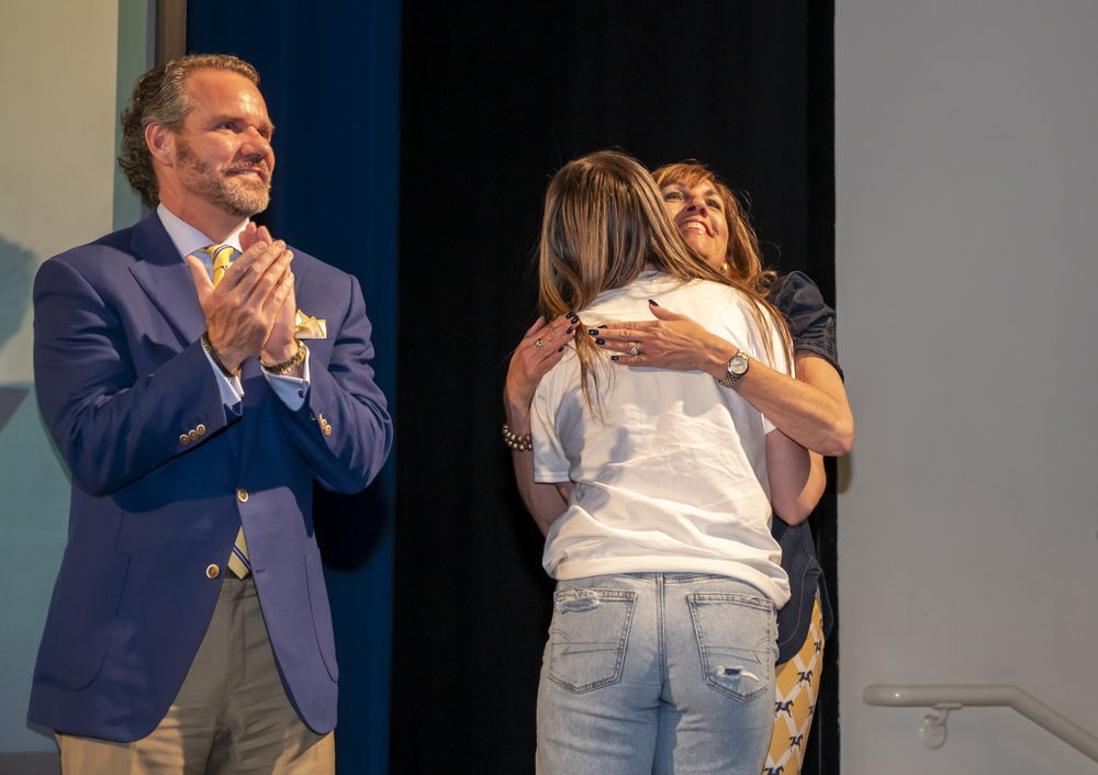 UCO First Lady Monica Lamb hugs a student at Teacher Signing Day.
