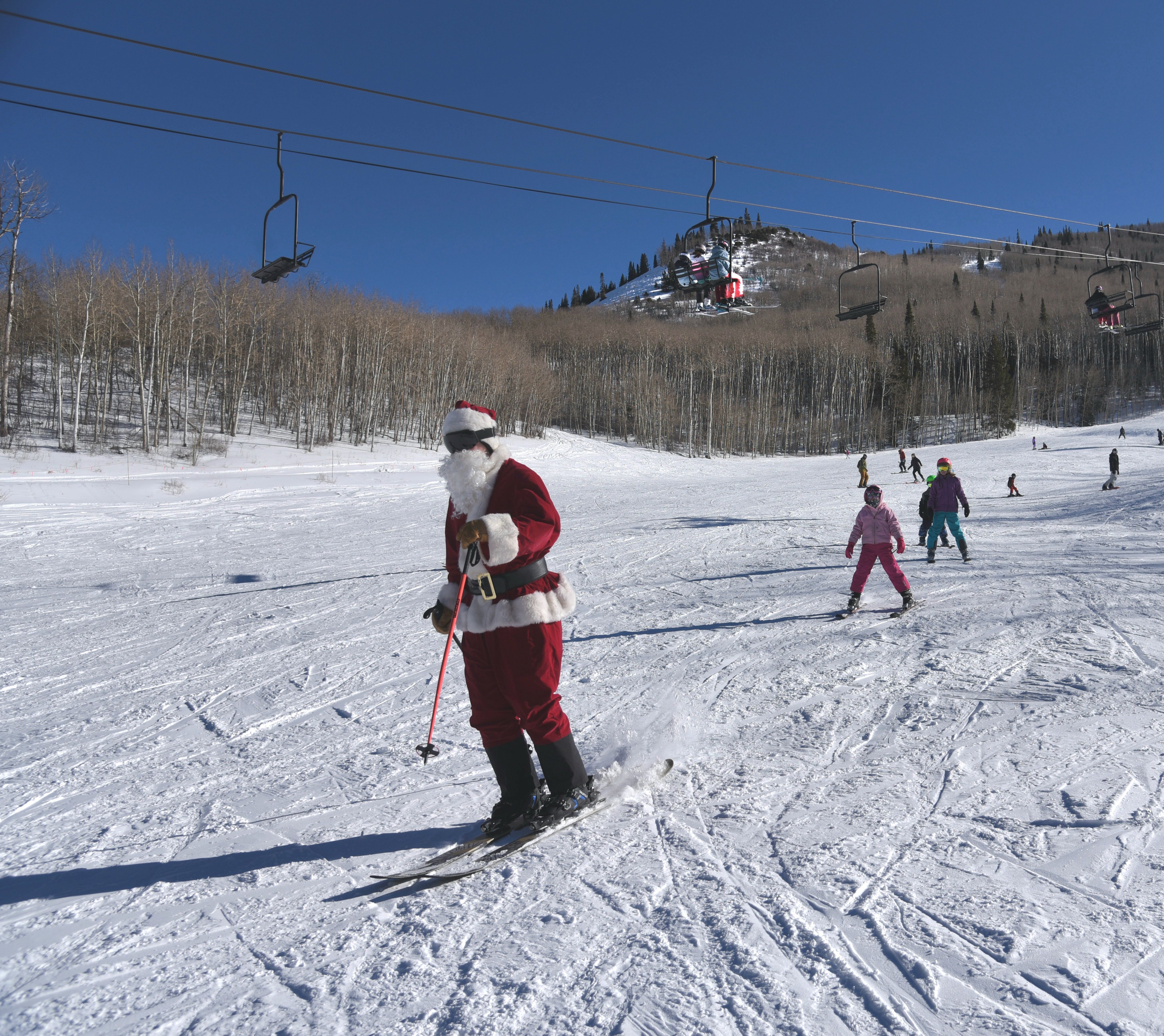Santa skis with kids at Sunlight Mountain Resort near Glenwood Springs, CO.