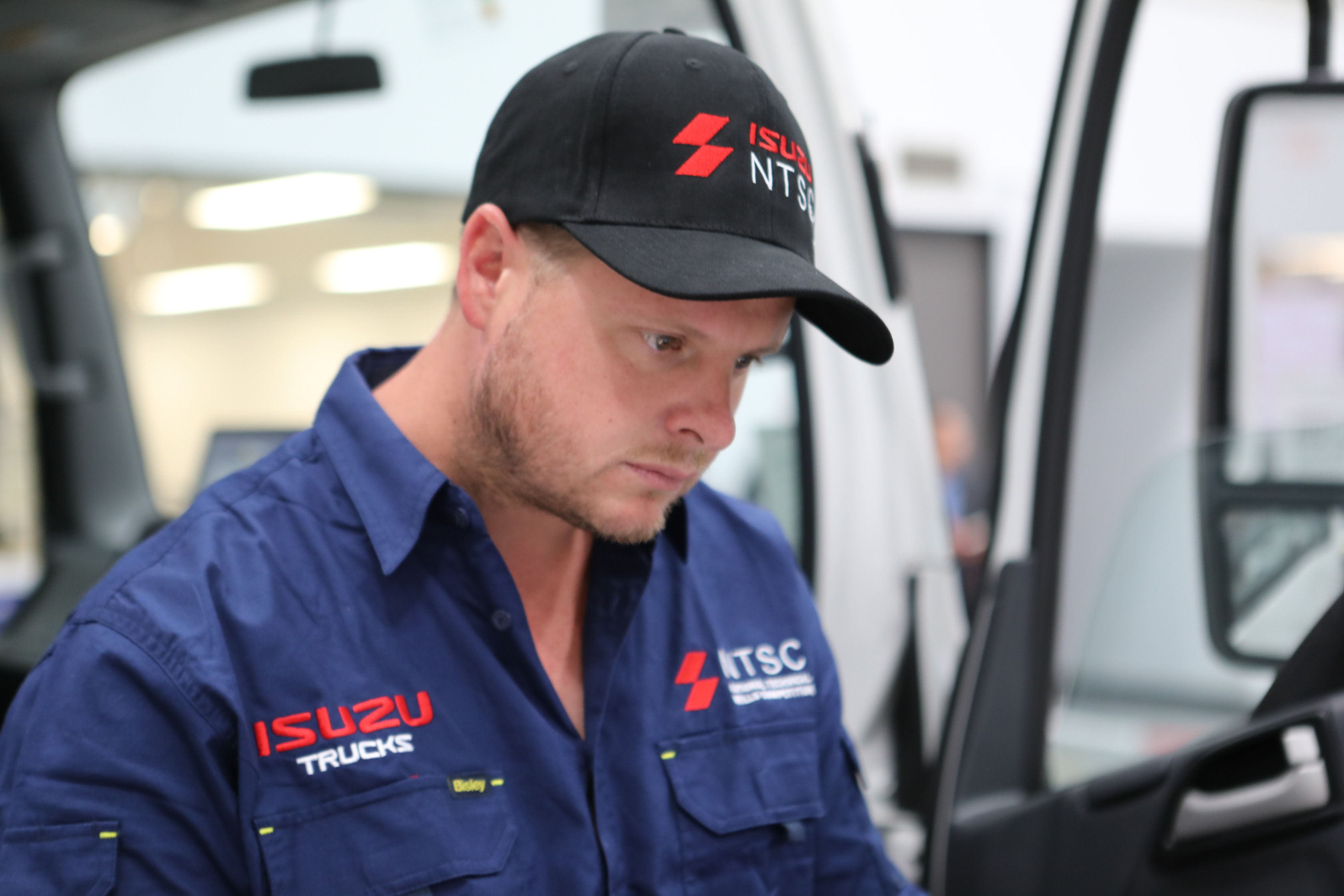 Jason Lee of Road Runner Mechanical Services, concentrating on vehicle diagnostics