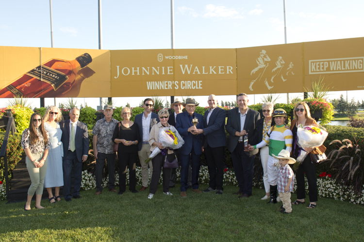Connections of Roscar in the Breeders' Stakes winner's circle on September 29, 2024 at Woodbine (Michael Burns Photo)