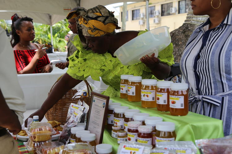 Saint Lucia Mango Festival - stand of mango jelly and mango cakes