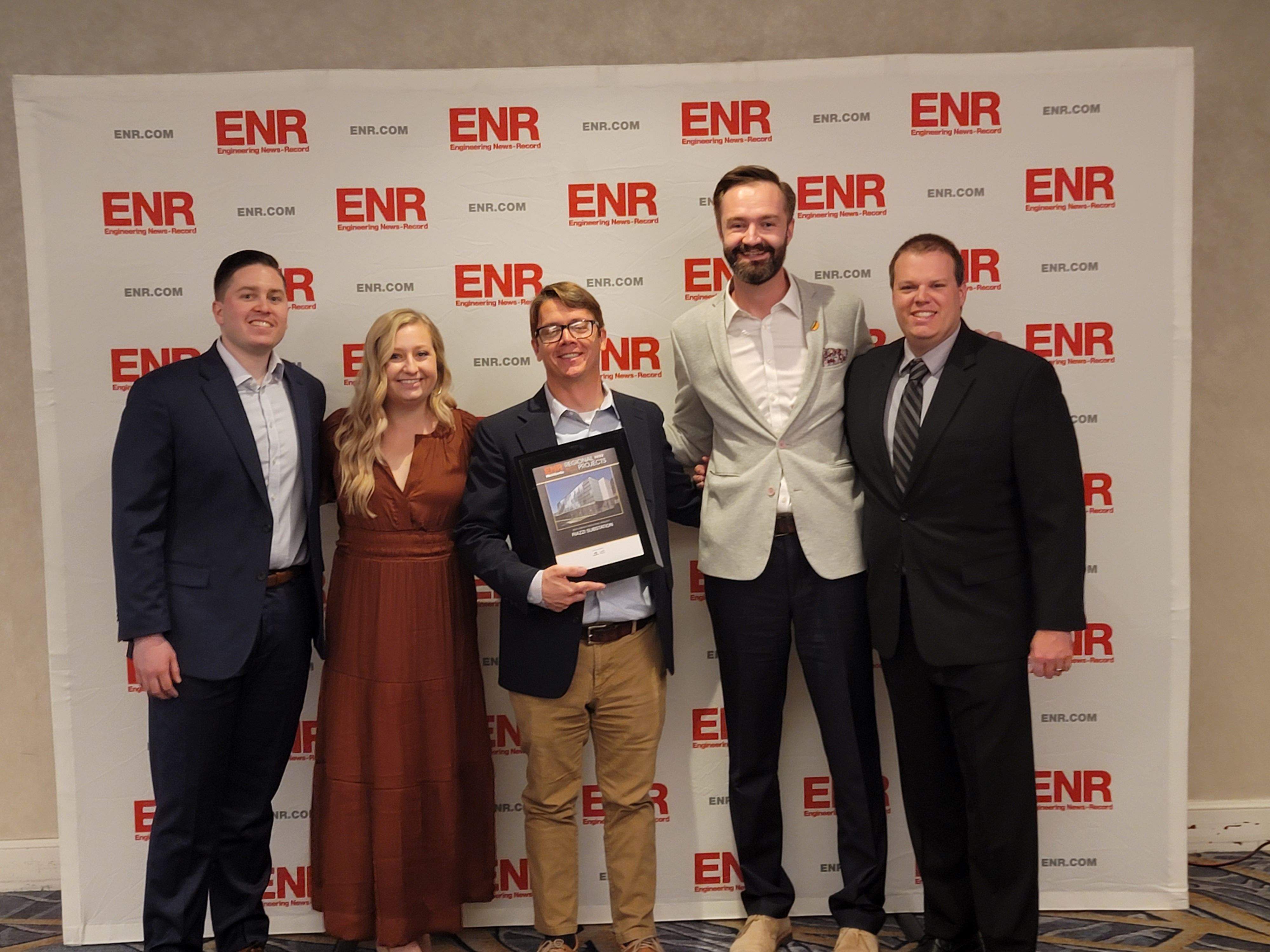 Pictured from left: Pat Burke and Colleen Nicolls from Burns & McDonnell; DLC Senior Project Manager Peter Francis; B&McD's Wally Petrovic and Brad Johnston accept the "MidAtlantic Project of the Year" award at the Engineer News-Record's Regional Best Projects Awards in Baltimore, Md. on Tuesday, October 25, 2022.