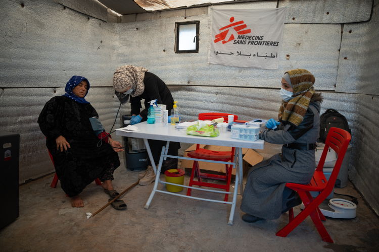 MSF medical activities in northwest Syria Copyright: Abdulrahman Sadeq/MSF Countries: Syria Date taken / Date Recorded: 19 December, 2023 Caption / Description: The MSF team conducts medical consultations with patients at a mobile clinic run by MSF in displacement camps in Sarmada area in northern Idlib governorate. Northwest Syria, December 2023.