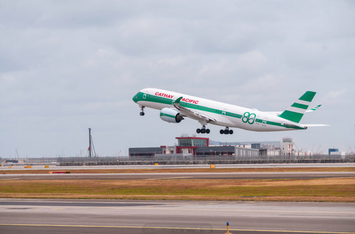 The Airbus A350 passenger aircraft, adorned with Cathay’s special retro livery, taking off from Singapore Changi Airport on 27 January 2026. The aircraft will continue to operate on international routes through 2026. (Photo: Cathay)
