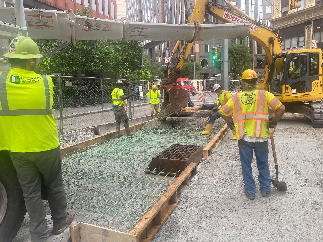 New concrete roadway being poured at Sixth and Liberty avenues