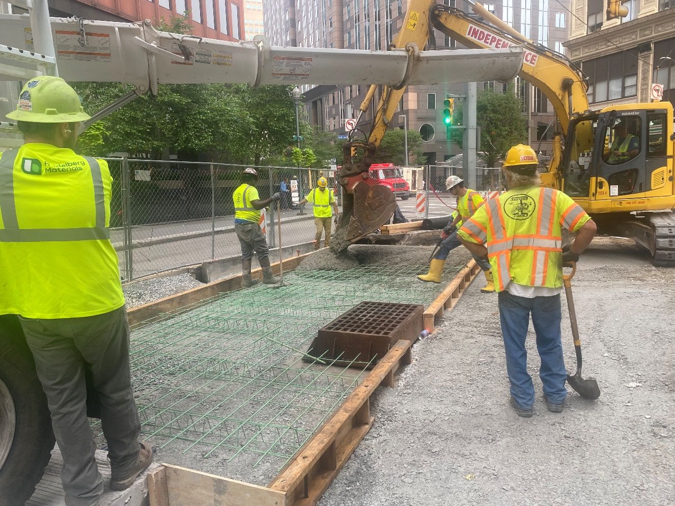 New concrete roadway being poured at Sixth and Liberty avenues New concrete roadway being poured at Sixth and Liberty avenues