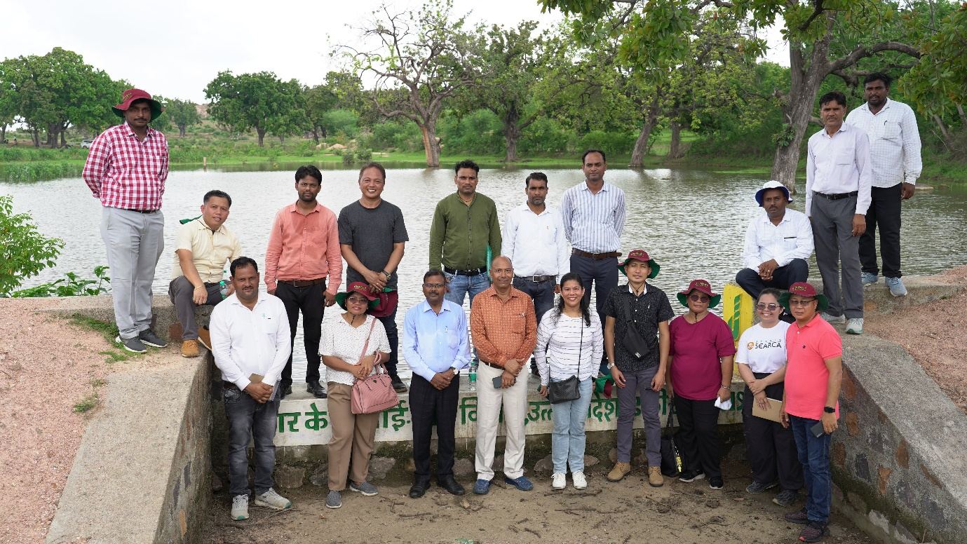 The delegation visits rainwater conservation sites in Pura Birdha, Uttar Pradesh.