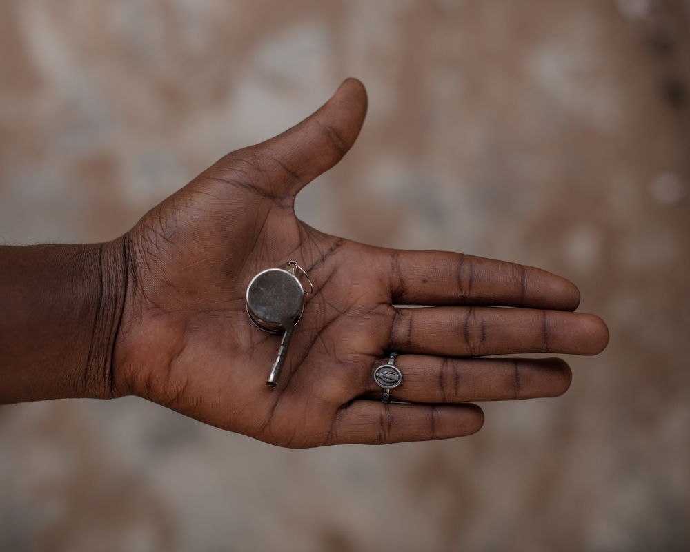 Dooshima was given a whistle at the MSF star clinic. This object is given to protect all the survivors who are living in a situation that is particularly vulnerable to sexual abuse. Photographer: Kasia Strek. Date: 14/12/2023. Location: Mbawa Camp, Benue