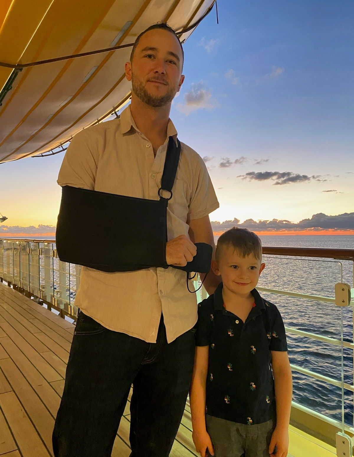 Bob McClure recovers with the best medicine, time with his son Ryder, after breaking his arm earlier this year. (supplied) 