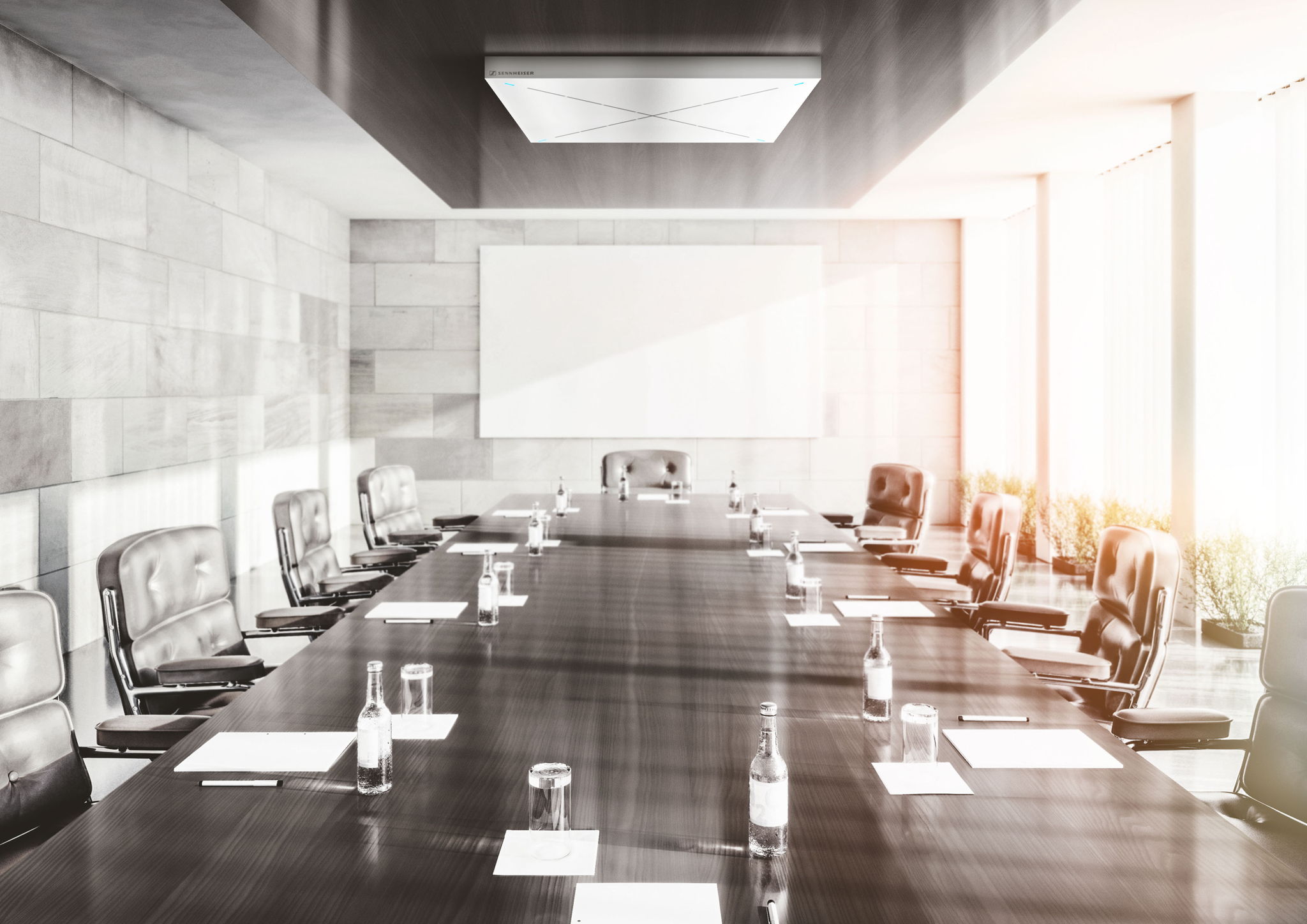 A minimalistically designed meeting room with natural light promotes the concentration of all meeting participants. A minimalistically designed meeting room with natural light promotes the concentration of all meeting participants.