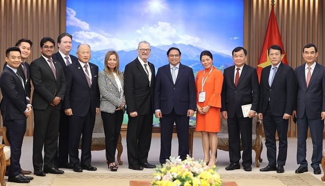 Prime Minister Phạm Minh Chính and the US-ASEAN Business Council (USABC) delegation in Hà Nội on Monday. — VNA/VNS Photo Dương Giang