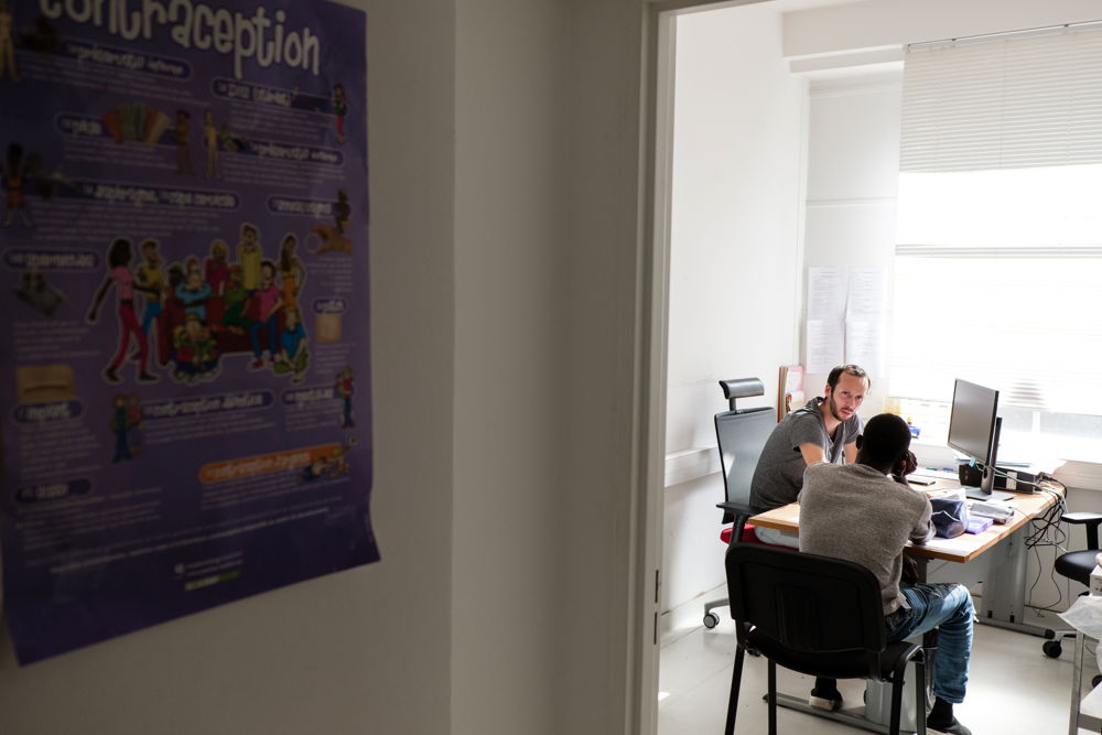 17 September 2018. A nurse receives a young man during a medical interview at MSF's centre in Pantin. Credit Augustin Le Gall