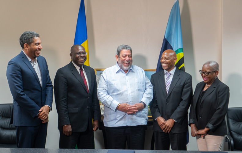 President of the Caribbean Development Bank, Dr. Gene Leon (second right) and Prime Minister of St. Vincent and the Grenadines (SVG) Dr. Ralph Gonsalves, (centre) were in a jovial mood after the Bank announced an Immediate Response Loan of US$5 mn and an Emergency Assistance Grant of US$300,000 to support the response to the La Soufriere volcanic eruption. The support package was announced at a press conference which was held at the Office of the Prime Minister in Kingstown. Also enjoying the moment are Minister of Finance, Economic Planning and Information Technology, Camilo Gonsalves, (far left) who serves as CDB Governor for SVG, CDB’s Vice President, Operations, Isaac Solomon (second left) and Dorla Humes, Advisor to the CDB President. The CDB team are on an official visit to SVG which is scheduled to run until Sunday July 25, 2021.
