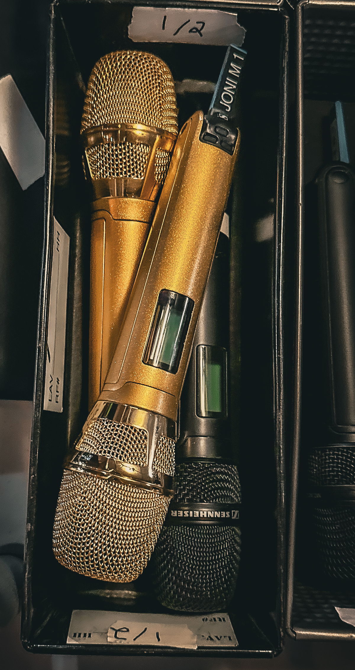 Brandi Carlile’s and Joni Mitchell’s Sennheiser SKM 6000 handheld transmitter with Neumann KK 205 microphone capsule, plated in gold (Photo credit: Yvonne Murray)