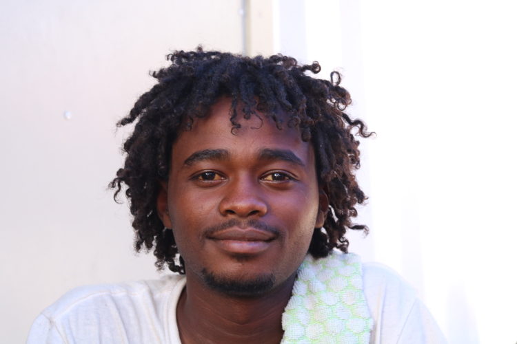 Muaz is 21 years old and from Sudan. He was in Libya for two years. 

He knows he is supposed to eat fruit to be healthy – and he likes apples – but his favourite food is ice-cream. 

Like many of the survivors on board Ocean Viking, he has tried to cross the Central Mediterranean Sea multiple times.
Copyright: Hannah Wallace Bowman/MSF