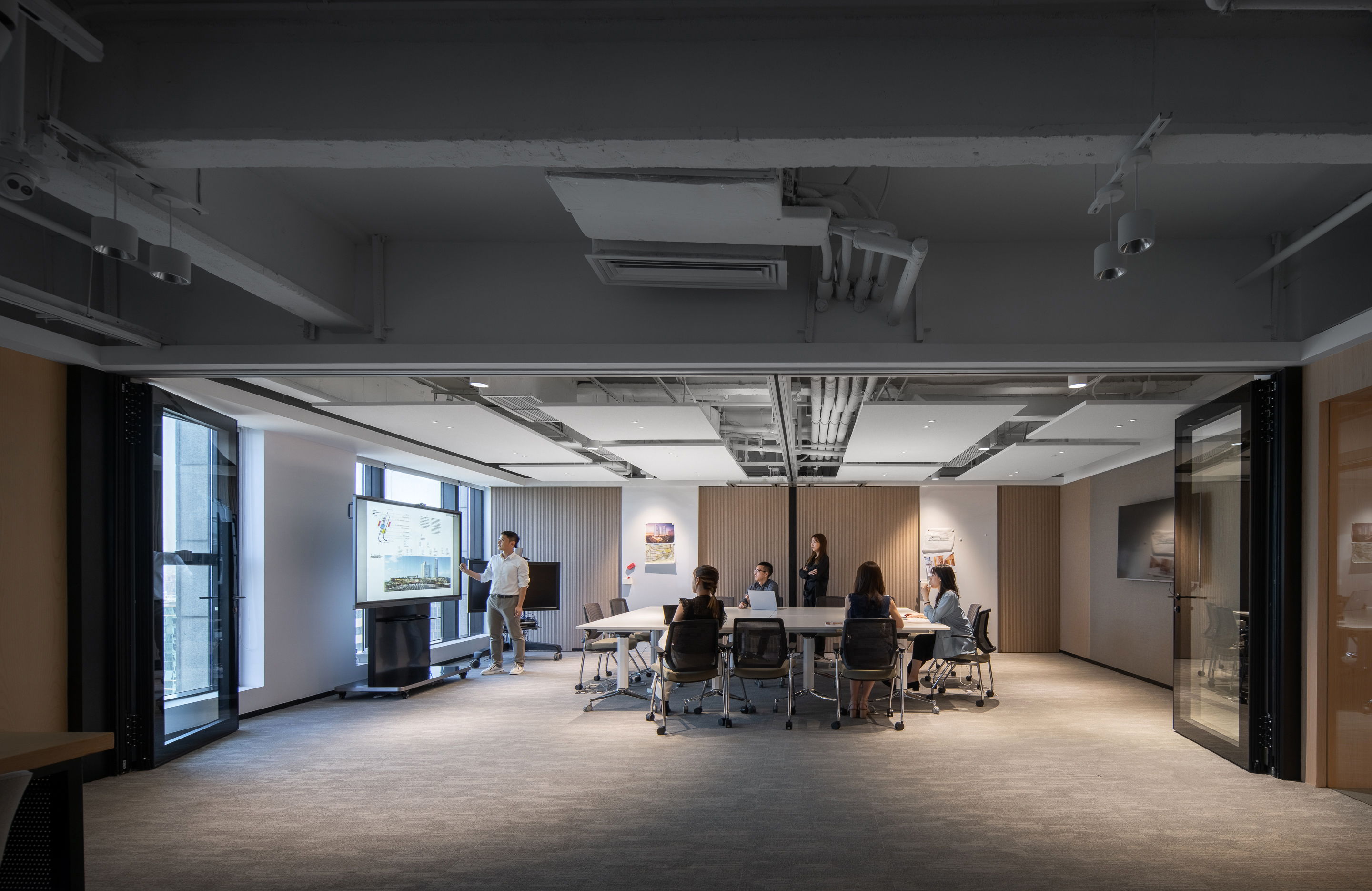 Flexible meeting spaces serve various business needs and encourage collaboration