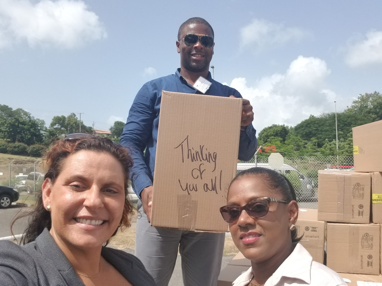 Team receiving donations at airport