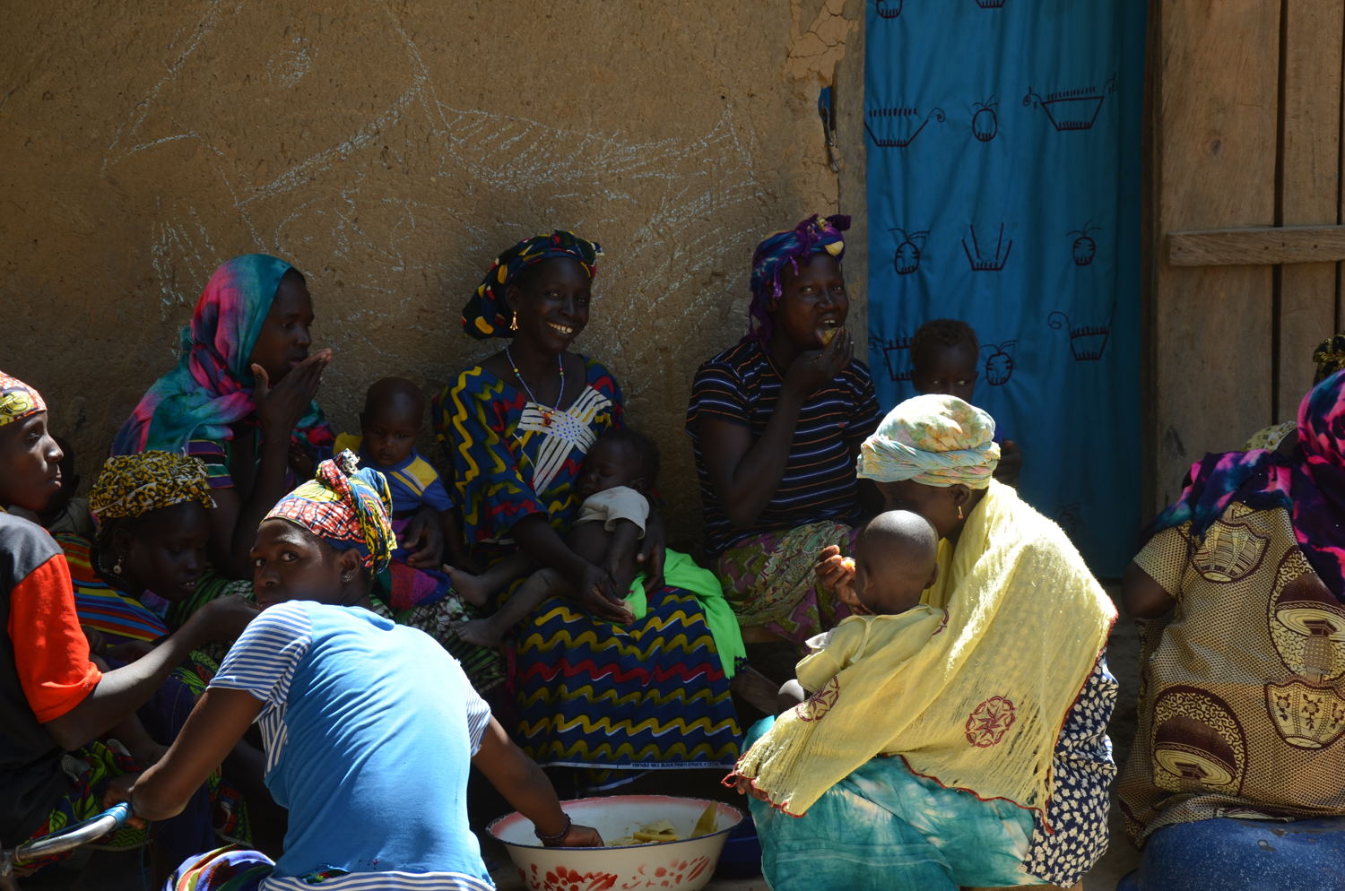 Mothers and children enjoy the nutritious food