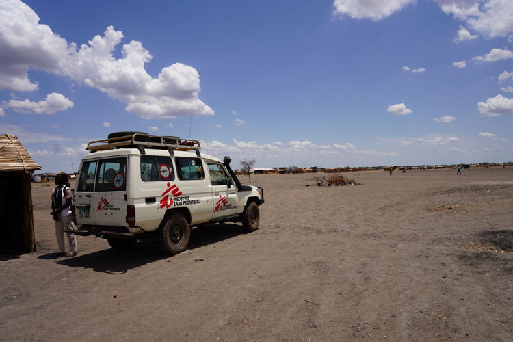 An MSF vehicle parked outside the mobile clinic at Zero transit site in Renk town of Upper Nile state in South Sudan. Hundreds of returnees from Sudan are living at the site with very limited basic necessities like shelter, water, sanitation, and food. Copyright - Nasir Ghafoor/MSF An MSF vehicle parked outside the mobile clinic at Zero transit site in Renk town of Upper Nile state in South Sudan. Hundreds of returnees from Sudan are living at the site with very limited basic necessities like shelter, water, sanitation, and food. Copyright - Nasir Ghafoor/MSF