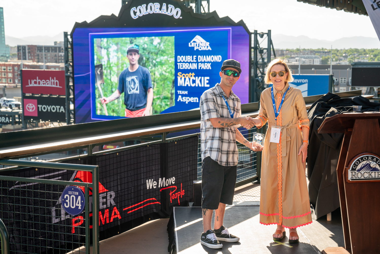 Terrain Park Specialist of the Year Award winner Scott Mackie (L) and CSCUSA President and CEO Melanie Mills (R)