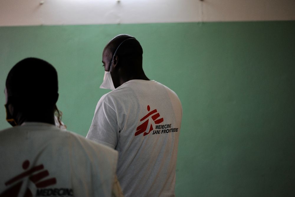Zachari, MSF HIV/AIDS Project Medical Referent at the Centre Hospitalier Universitaire Communautaire (CHUC) in Bangui, and his colleague are starting their first round of visits to the patients diagnosed with advanced HIV. Photographer: Marco  Scardovi