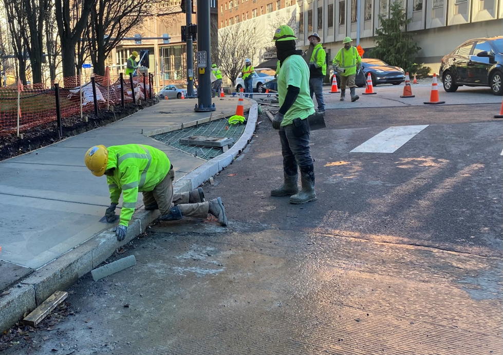 PRTs contractor finishing sidewalk restoration at Sixth and Centre avenues PRTs contractor finishing sidewalk restoration at Sixth and Centre avenues