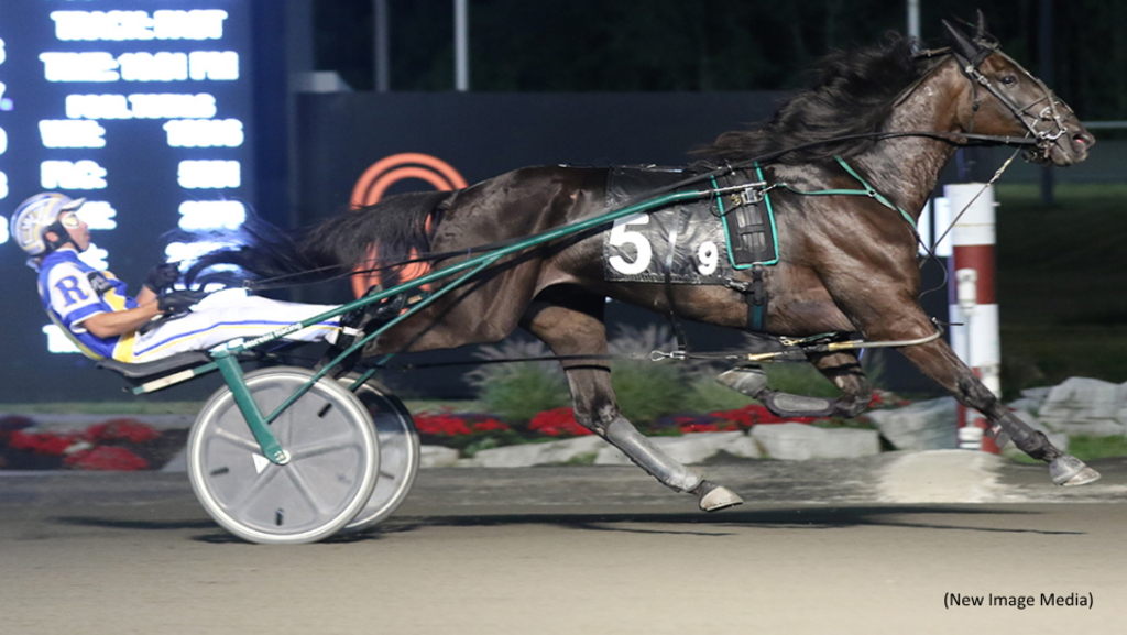 Fashion Frenzie and driver Louis-Philippe Roy at Woodbine Mohawk Park (New Image Media) 