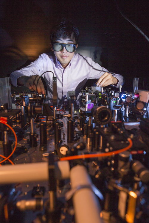 Kai Wang in the lab. Image credit: Lannon Harley, ANU