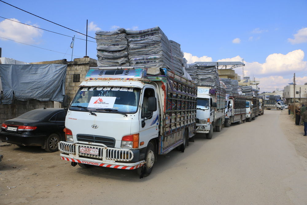 Trucks chartered by MSF teams from Atmeh hospital, on their way to a distribution, February 11, 2023. Photographer: Abdul Majeed Al Qareh