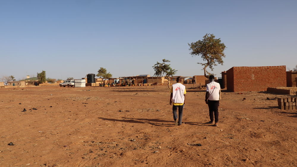 MSF teams visiting a newly rehabilitated borehole in the town of Titao in Burkina Faso’s North region. The lack of clean water can cause different parasitic infections and other water-borne diseases such as cholera and diarrhoea. Photographer: Noelie Sawadogo