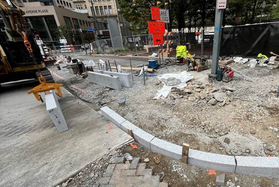 New sidewalk recently placed at Fifth Avenue and Market Street