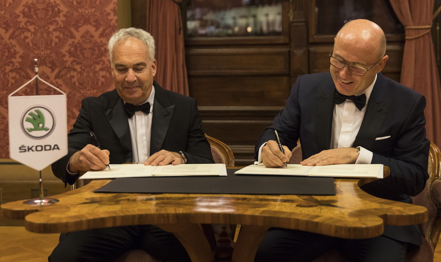 ŠKODA CEO Bernhard Maier (on the right), Champion Motors representative Erez Vigodman signed the documents for the foundation of the joint venture on the 14 December 2017 at the Rudolfinum in Prague's Old Town.