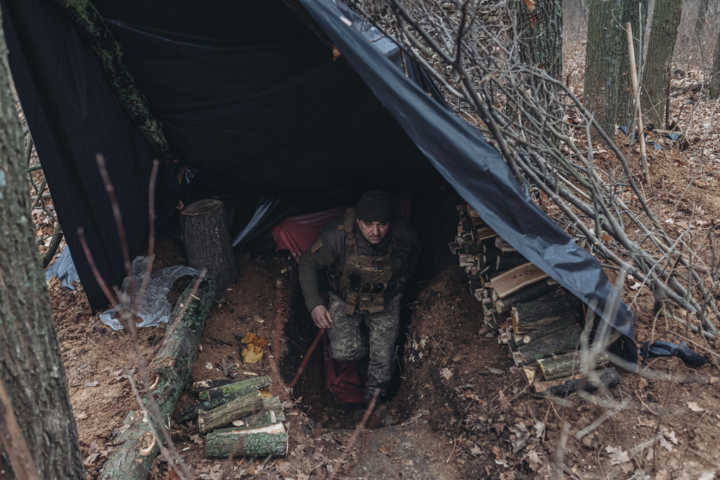 DONETSK, UKRAINE - NOVEMBER 27: A Ukrainian soldier is seen in his position on the Bakhmut frontline, Donetsk, Ukraine on November 27, 2022. Intense military activity in the city under the control of the Ukrainian army draws attention, which is on the front line where warplanes, artillery systems, tanks and other heavy weapons are used day and night. /  Diego Herrera Carceno